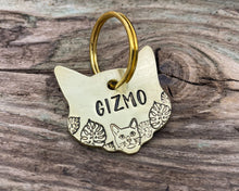 Load image into Gallery viewer, Cat head pet id tag, hand stamped with cute cat and leaves
