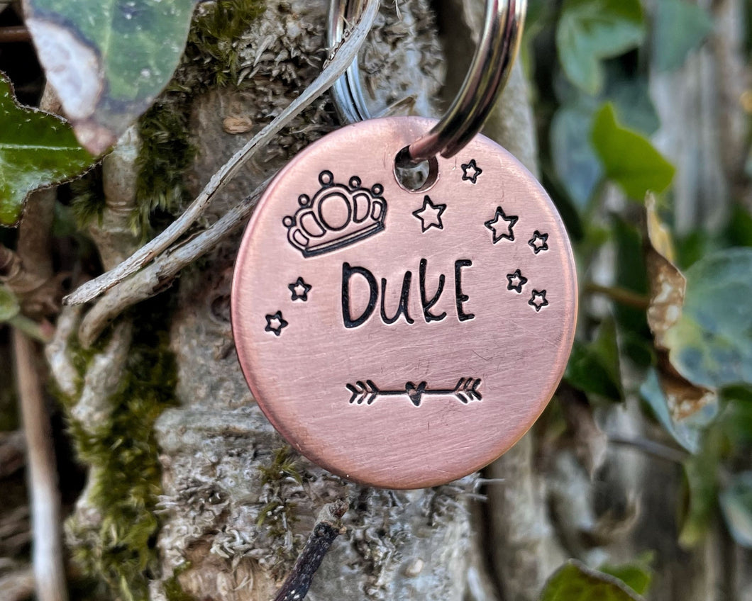 Small dog id tag, hand stamped with crown and stars