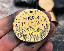 Load image into Gallery viewer, Large pet id tag, hand stamped with trees, mountains, moon &amp; stars
