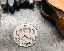 Load image into Gallery viewer, large handmade dog tag with moon and mountain design

