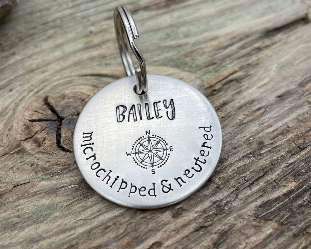 'Microchipped' Dog id tag, hand stamped with compass & phone numbers