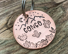 Load image into Gallery viewer, Mountain dog tag, hand-stamped with river, cactus and stars
