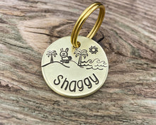 Load image into Gallery viewer, Small dog id tag, hand stamped with bunny and palm trees
