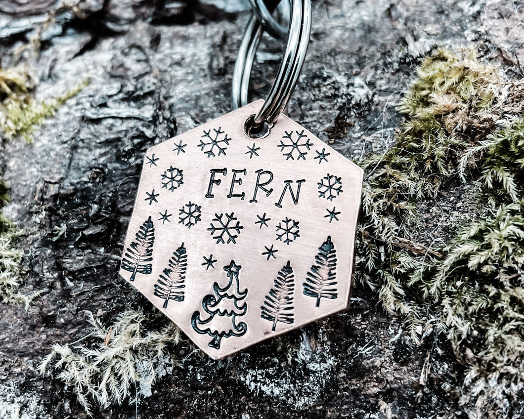 Hexagon dog tag, hand stamped with Christmas design & snowflakes