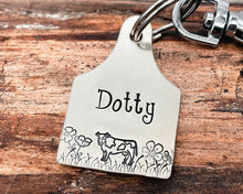 Load image into Gallery viewer, Custom dog id tag, cow ear tag, hand stamped pet id tag with cute cow and flower design
