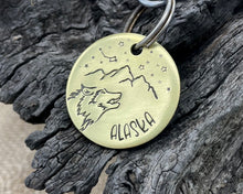 Load image into Gallery viewer, Dog id tag, hand stamped with wolf head, mountains &amp; star design
