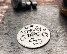 Load image into Gallery viewer, hand-stamped dog tag with spooky dog design
