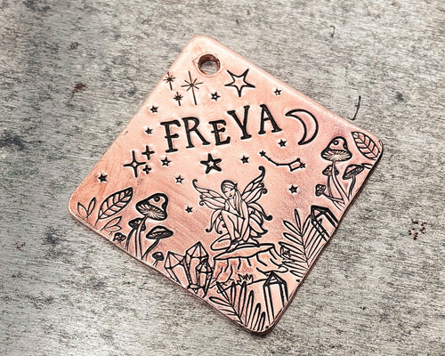 square metal dog tag with fairy design