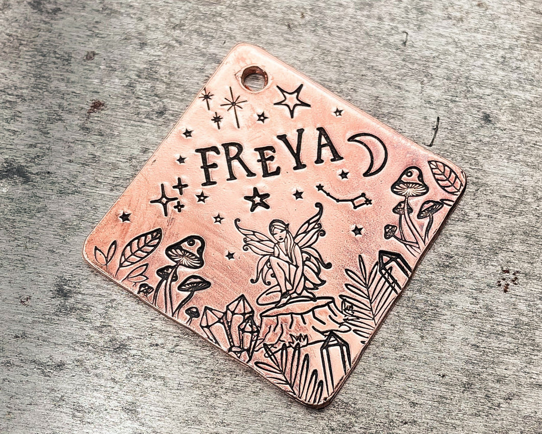 square metal dog tag with fairy design