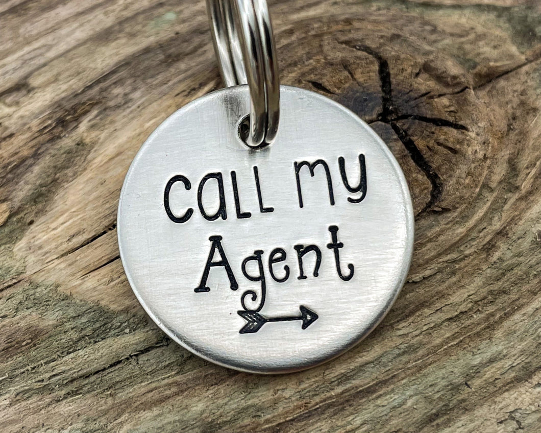 Funny small dog id tag, hand stamped with 'Call my agent'