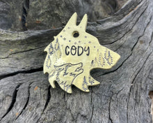 Load image into Gallery viewer, Wolf head dog tag, handstamped with wolf &amp; trees
