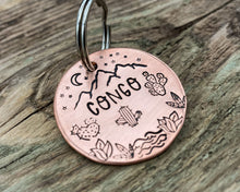 Load image into Gallery viewer, Mountain dog tag, hand-stamped with river, cactus and stars
