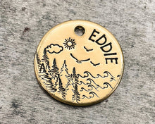 Load image into Gallery viewer, cute small brass dog tag with lake and trees
