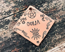 Load image into Gallery viewer, Ouija spooky dog tag, hand stamped square dog id tag with ouija design, 2 phone numbers or address on the back
