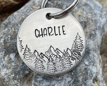 Load image into Gallery viewer, Dog name tag, hand stamped with mountains and trees
