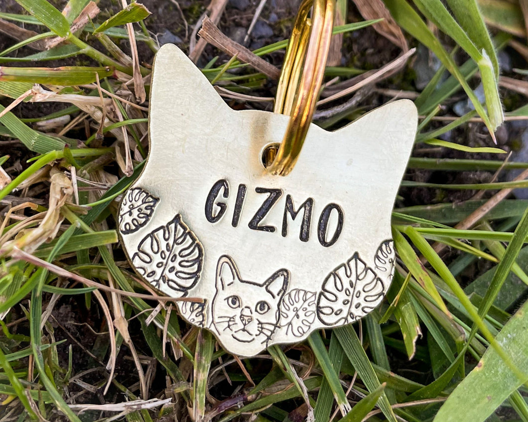 Cat head pet id tag, hand stamped with cute cat and leaves