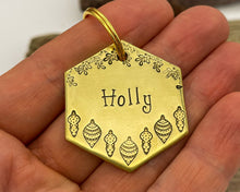 Load image into Gallery viewer, Christmas hexagon dog tag, hand stamped with holly and Christmas baubles

