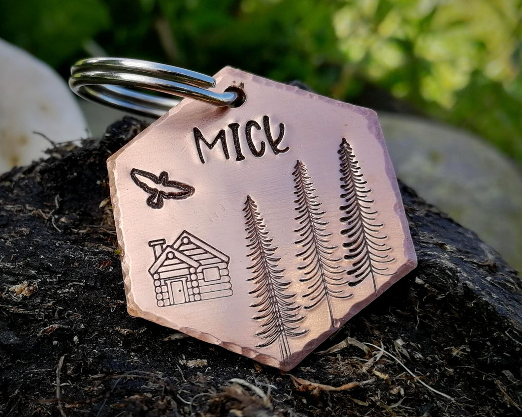 Hexagon dog name tag, handstamped with cabin & trees