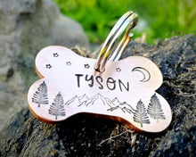 Load image into Gallery viewer, Bone dog tag, hand stamped with mountains &amp; trees
