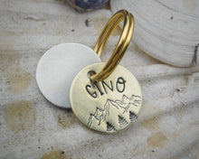Load image into Gallery viewer, Cat id tag, hand stamped with mountains &amp; trees
