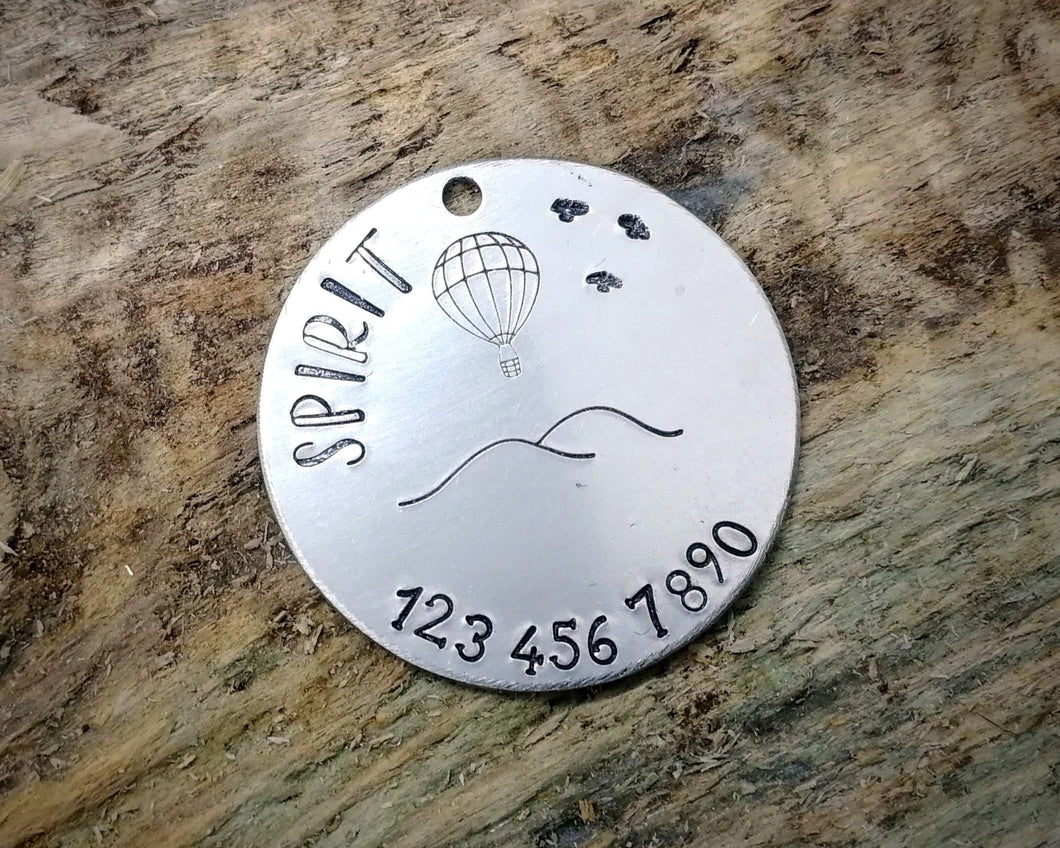 Dog tag, hand stamped with balloon & phone number