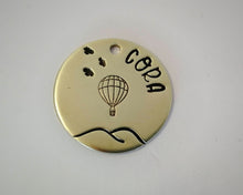 Load image into Gallery viewer, Small pet id tag, hand stamped withlandscape design &amp; balloon
