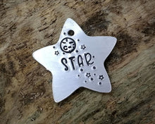 Load image into Gallery viewer, Small pet id tag, Aluminium star hand stamped with moon &amp; stars, lightweight cat tag
