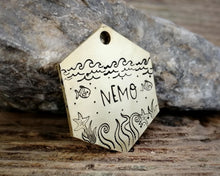 Load image into Gallery viewer, Hexagon dog tag, hand stamped with nautical design, octopus &amp; fish
