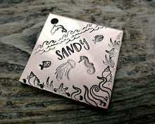 Load image into Gallery viewer, Square dog tag, handstamped with ocean design, seahorse &amp; fish
