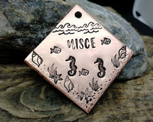 Load image into Gallery viewer, Square dog id tag, hand stamped with ocean design, seahorse &amp; fish
