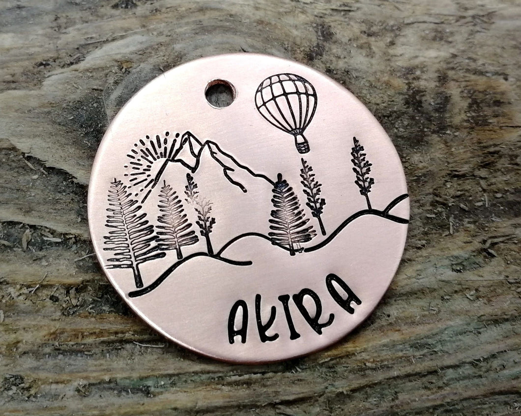 Dog id tag, hand stamped with landscape & balloon