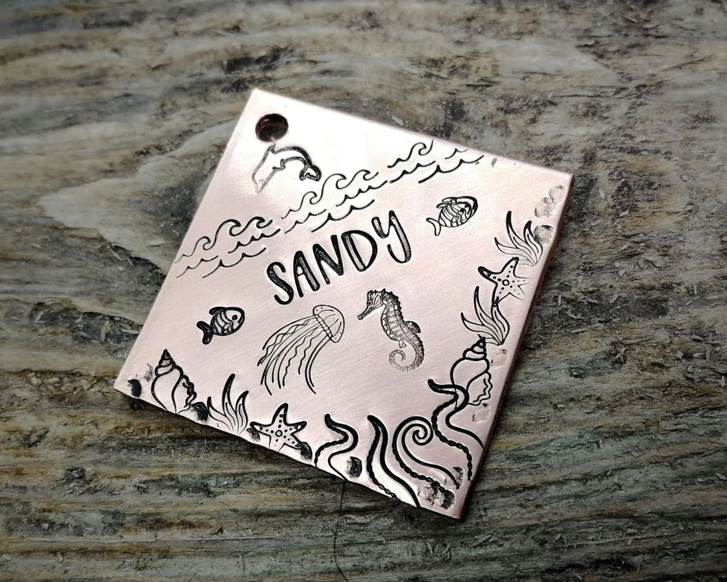 Square dog tag, handstamped with ocean design, seahorse & fish