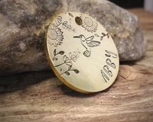 Load image into Gallery viewer, Small pet id tag, hand stamped with flower design &amp; hummingbird
