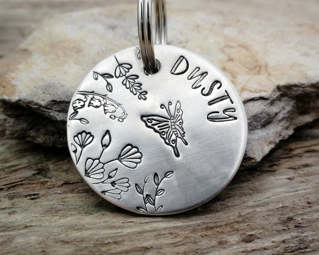 Dog tag, hand stamped with butterfly & flowers