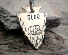 Load image into Gallery viewer, Arrow head dog tag with bear and trees
