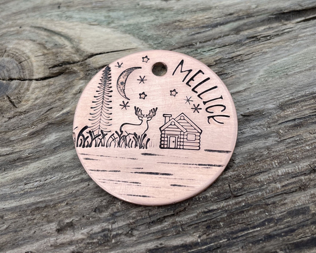 Dog id tag, landscape design with tree, deer & cabin