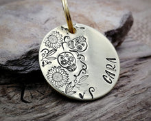 Load image into Gallery viewer, Dog id tag, hand stamped with sugar skull design &amp; flowers
