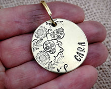 Load image into Gallery viewer, Dog id tag, hand stamped with sugar skull design &amp; flowers
